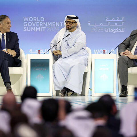 Diplomatic advisor to the United Arab Emirates President Anwar Gargash (C) react on stage with Former US Secretary of State Mike Pompeo (L) and Atlantic Council President and CEO Frederick Kempe (R) during the World Governments Summit in Dubai on February 3, 2026. Spain will seek to ban social media for under-16s to protect them from harmful content such as pornography and violence, Prime Minister Pedro Sanchez said on February 3, in the latest such move by governments. Australia established a world first i