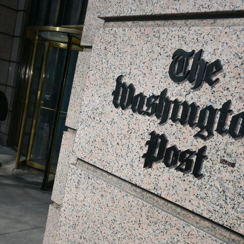A man exits the Washington Post office building in Washington, DC, on Feb. 4, 2026. 