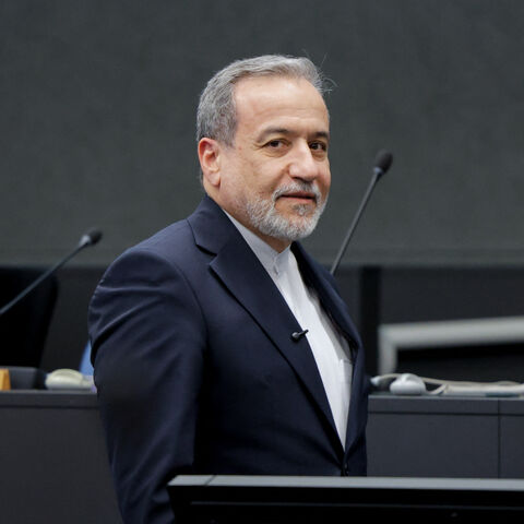 Iran's Foreign Minister Abbas Araghchi looks on upon his arrival to deliver a speech during a session of the United Nations Conference on Disarmament, on the sideline of a second round of US-Iranian talks with Washington pushing Tehran to make a deal to limit its nuclear program, in Geneva, on Feb. 17, 2026. 