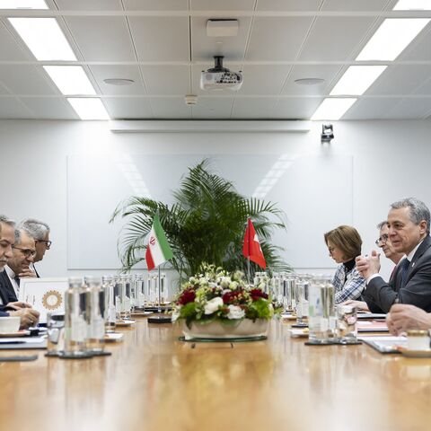 Iran's Foreign Minister Abbas Araghchi (3rd L) and Switzerland's Foreign Minister Ignazio Cassis (2nd R) attend a bilateral meeting between Switzerland and Iran during a second round of US-Iranian talks with Washington pushing Tehran to make a deal to limit its nuclear program, in Geneva on Feb. 17, 2026. 