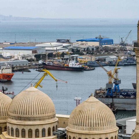 Bibi Heybat mosque is seen in front of Bibi Heybat Oil Field, situated at the coast of the Caspian Sea outside Baku on March 19, 2019. 