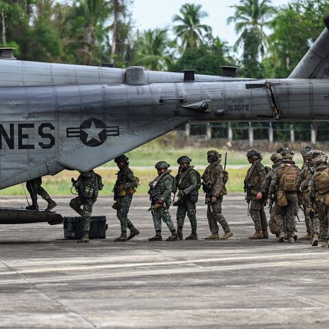 Soldiers board a US Marines CH-53 Super Stallion during an airfield seizure exercise as part of the US-Philippines Balikatan joint military exercise at San Vicente Airport in Palawan on May 1, 2024. 
