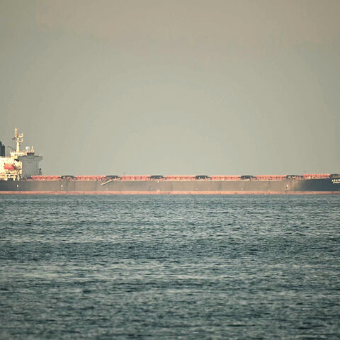 A cargo ship is pictured off the coast of Fujairah in the Strait of Hormuz, in the northern emirate, Feb. 25, 2026.