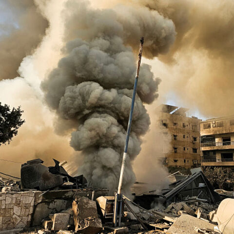 TOPSHOT - Smoke rises from the site of an Israeli airstrike on the southern suburbs of Beirut on March 3, 2026. The Israeli military issued new evacuation orders for dozens of locations in Lebanon on March 3, including warning residents in two southern Beirut neighbourhoods to stay away from several buildings ahead of an imminent operation. (Photo by AFP via Getty Images)