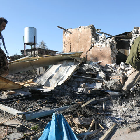 An Iranian Kurdish Peshmerga member of the Kurdistan Democratic Party of Iran (KDPI) inspects damage sustained at the Azadi Camp of the Kurdistan Democratic Party of Iran (KDPI) following an Iranian cross-border attack in the town of Koye (Koysinjaq), in the east of Erbil district in the autonomous Kurdish region of northern Iraq on March 3, 2026. The United States and Israel launched strikes against Iran on February 28, with the killing of Iran's supreme leader and the Islamic republic retaliated with barr