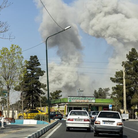 Plumes of smoke rise following an explosion on March 5, 2026, in Tehran, Iran.