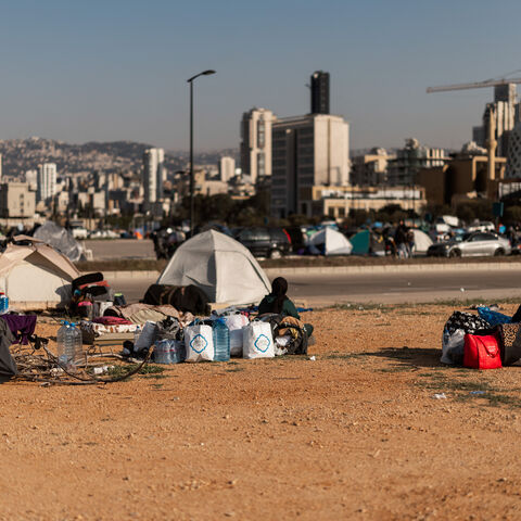 Displaced families set up tents along Beirut's waterfront in Beirut, Lebanon, on March 10, 2026, after fleeing recent Israel-Hezbollah hostilities.