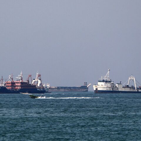 Fishing and cargo ships and ferries are pictured in the Gulf off the Iranian port city of Bandar Abbas, which is the main base of the Islamic Republic's navy and has a strategic position on the Strait of Hormuz, on April 29, 2019. 