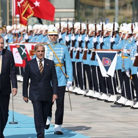 Turkish President Recep Tayyip Erdogan (L) walks with Prime Minister of Pakistan Shehbaz Sharif upon his arrival during an official ceremony at the Presidential Complex in Ankara, Turkey on June 1, 2022. (Photo by Adem ALTAN / AFP) (Photo by ADEM ALTAN/AFP via Getty Images)