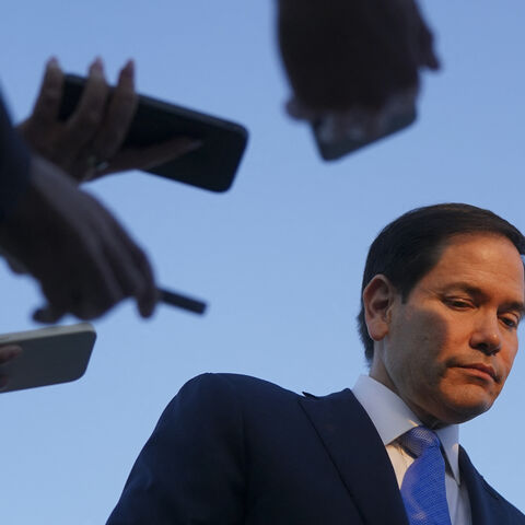 US Secretary of State Marco Rubio speaks to the press as he departs Tel Aviv for Qatar following an official visit, at Ben Gurion International Airport, near Lod, Israel, September 16, 2025. Israel heavily bombarded Gaza City on September 16 2025, witnesses told AFP, after US Secretary of State Marco Rubio backed Israeli Prime Minister Benjamin Netanyahu's new offensive there and its stated goal of eradicating Hamas. (Photo by NATHAN HOWARD / POOL / AFP) (Photo by NATHAN HOWARD/POOL/AFP via Getty Images)
