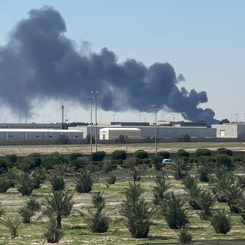 Smoke rises from an area of Kuwait's international airport after a reported drone strike on April 1, 2026. Kuwait's civil aviation authority said that the Gulf state's international airport had come under an Iranian drone attack that led to "a large fire" at a fuel depot. (Photo by AFP via Getty Images) / Kuwait OUT / KUWAIT OUT