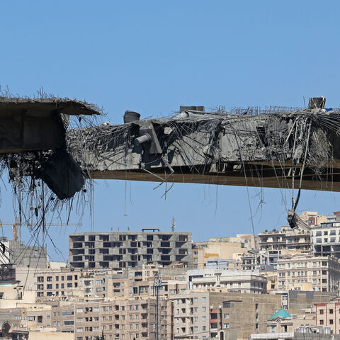 TOPSHOT - A view of the B1 bridge is pictured, a day after it was destroyed by a strike in Karaj, around 20miles (35kms) southwest of Tehran, April 3, 2026. US President Donald Trump said on April 2 the tallest bridge in Iran had been destroyed, hours after threatening to bomb the country "back to the Stone Ages." (Photo by ATTA KENARE / AFP via Getty Images) /