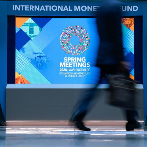 A man walks through the atrium during the 2026 IMF and World Bank Group Spring Meetings in Washington, DC, on April 14, 2026. (Photo by Kent NISHIMURA / AFP via Getty Images)