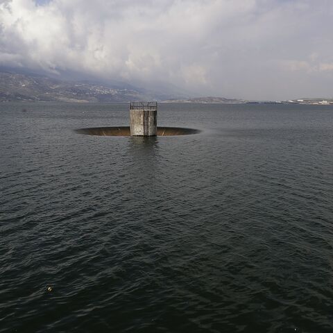 A partial view shows a drainage vacuum hole on the lake of Qaraoun in Lebanon's southern Beqaa Valley on April 5, 2019. 