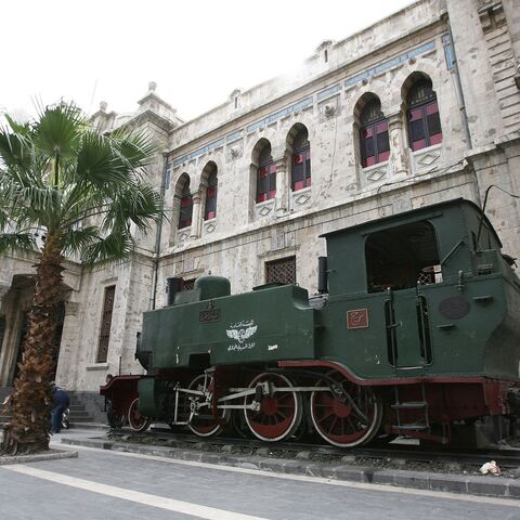 An old locomotive sits outside the Hejaz rail station in old Damascus on February 23, 2010. The Hejaz railway ran from Damascucs to Medina in Saudi Arabia and was part of the Ottoman railway network. AFP PHOTO/LOUAI BESHARA (Photo credit should read LOUAI BESHARA/AFP via Getty Images)