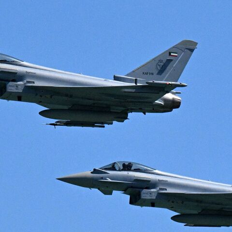 Kuwaiti Air Force Eurofighter Typhoon fighter aircraft fly over during an airshow commemorating Kuwait's 64th Independence Day in Kuwait City on Feb. 25, 2025. 