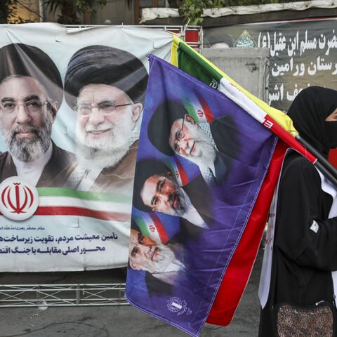 People from Tehran province gather in support and allegiance to Iranian Supreme Leader Mojtaba Khamenei, while holding Iranian flags and images of both the new and former leaders of Iran, on June 12, 2026, at Palestine Square in Tehran, Iran. 