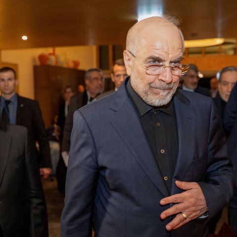 Speaker of the Parliament of Iran, Mohammad Bagher Ghalibaf (R) arrives at the Burgenstock resort in Obbuergen, near Lucerne on June 21, 2026. 