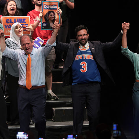 Congressional candidate Claire Valdez, Congressional candidate Brad Lander, Mayor Zohran Mamdani, and Congressional candidate Darializa Avila Chevalier raise their hands during a Get Out the Vote (GOTV) rally at King's Theater on June 18, 2026 in New York City.