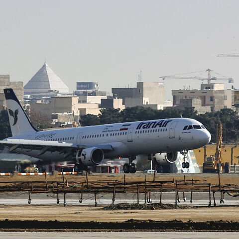 An Airbus A321 airliner arrives at the Mehrabad international airport during the delivery of the first batch of planes to the Iranian state airline Iran Air in the capital Tehran on Jaunary 12, 2017. - The aircraft arrived as part of an order for 100 other Airbus planes with a list price of around $20 billion (19 billion euros) on December 22, placed after the lifting of international sanctions on the Islamic republic. It will be used for internal flights landed at Tehran's Mehrabad airport. (Photo by ATTA 
