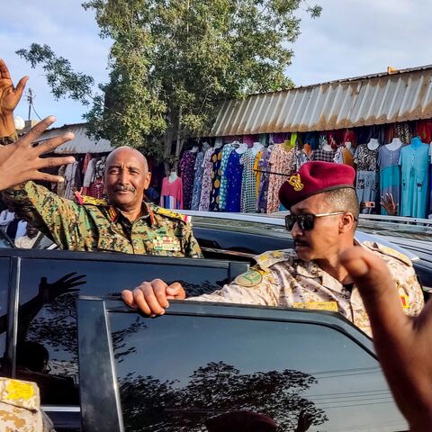 Sudan's de facto leader and armed forces chief Abdel Fattah al-Burhan greets supporters in Port Sudan, Dec. 29, 2024.