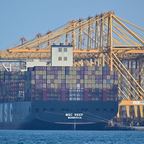 The Liberian-flagged container vessel MSC Reef is seen docked along a pier at the Khor Fakkan Container Terminal, the only natural deep-sea port in the region and one of the major container ports in Sharjah Emirate, along the Gulf of Oman, on June 28, 2026.