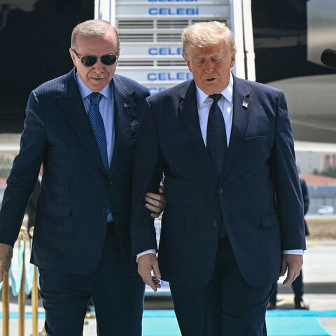 Turkish President Recep Tayyip Erdogan (L) welcomes US President Donald Trump (R) upon his arrival on Air Force One at Etimesgut Air Base near Ankara, on July 7, 2026, before attending the 36th NATO Heads of State and Government Summit. (Photo by SAUL LOEB / AFP via Getty Images)