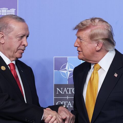 Recep Tayyip Erdogan, president of Turkey, greets Donald Trump, president of United States, during a welcome ceremony of allied heads of state and government, on July 8, 2026, in Ankara, Turkey.