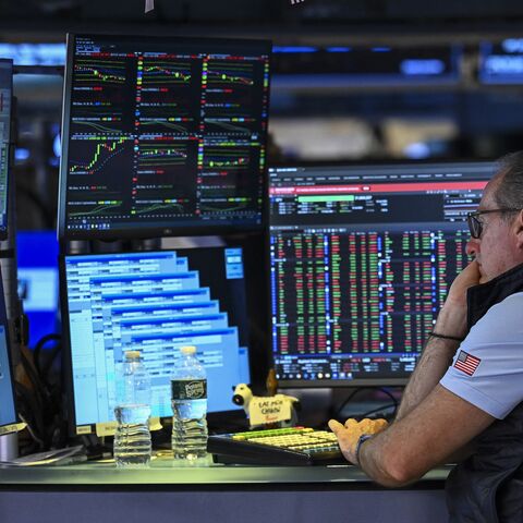 A trader works on the floor of the New York Stock Exchange on July 24, 2026, in New York. 