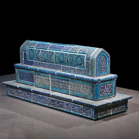 A blue and turquoise glazed ceramic cenotaph decorated with Arabic calligraphy and floral motifs, on display during the exhibition "Uzbekistan: Heritage in Motion" at the Museum of Islamic Art in Doha. (Photo courtesy of MIA)