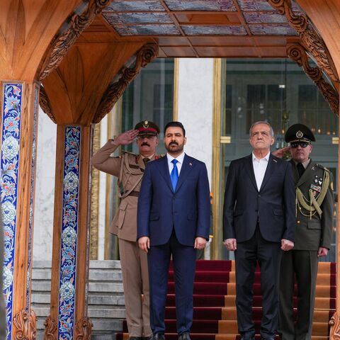 Iraqi Prime Minister Ali al-Zaidi is welcomed to the Saadabad Palace in Tehran by Iranian President Masoud Pezeshkian, July 23, 2026.