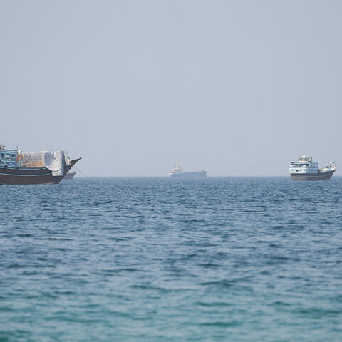 Vessels near the Strait of Hormuz, as seen from Musandam, Oman, August 6, 2026. REUTERS/Stringer