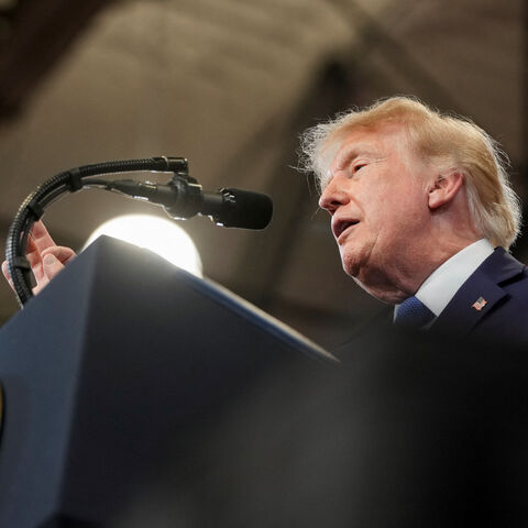 U.S. President Donald Trump delivers remarks at David S. Mack Center for Training and Intelligence in Garden City, New York, U.S., August 14, 2026. REUTERS/Ken Cedeno