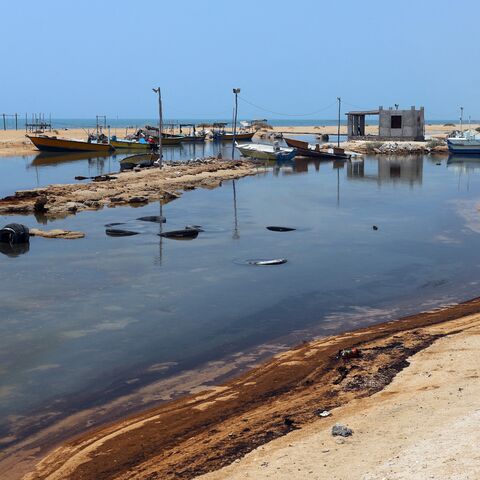 A photograph obtained from the Iranian Students’ News Agency shows an oil slick along the southern coast of Qeshm Island, Iran, August 13, 2026. 