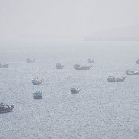 FILE PHOTO: Vessels near the Strait of Hormuz, as seen from Musandam