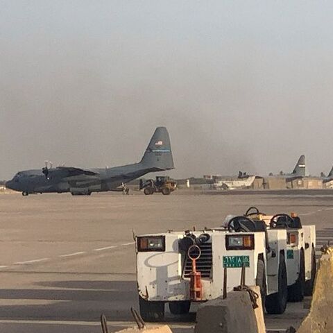 A US military transport aircraft stands at Camp Victory near Baghdad International Airport in Baghdad