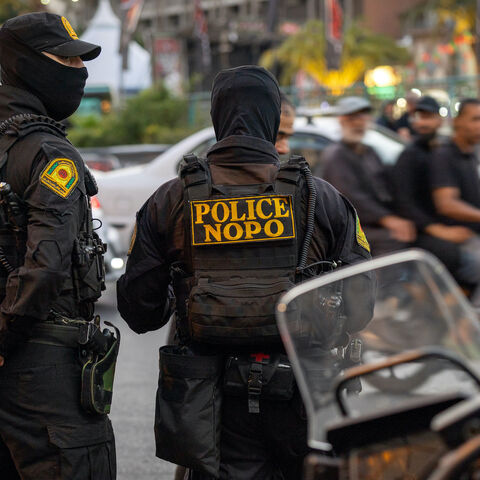 Iranian security forces stand guard in the capital city on July 03, 2026 in Tehran, Iran.
