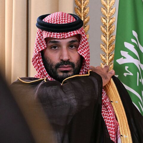 Saudi Arabia's Crown Prince Mohammed bin Salman looks on as he attends a trade agreement signature ceremony at the Elysee Palace in Paris on August 24, 2026. (Photo by LOU BENOIST / POOL / AFP via Getty Images)