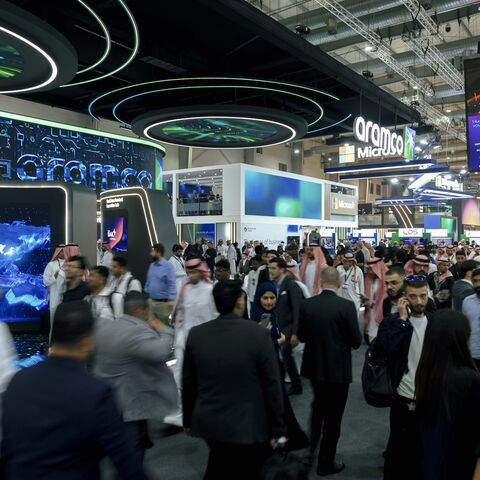 Attendees walk through the exhibition hall at the LEAP 2026 technology conference in Riyadh, Saudi Arabia, Aug. 31, 2026. — LEAP