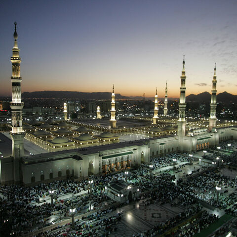 The Prophet Mohammed Mosque is lit during the sunset prayers in the holy Saudi city of Medina 11 January 2005. Saudi Arabia began receiving Muslim pilgrims early this month in preparation for the annual hajj (pilgrimage), scheduled to take place in the last two weeks of January. Islam's Prophet Mohammed is buried in Medina's landmark mosque, which is Islam's second holiest shrine. All Muslims are required to make the pilgrimage to the Muslim holy city of Mecca, one of the five pillars of Islam, at least onc