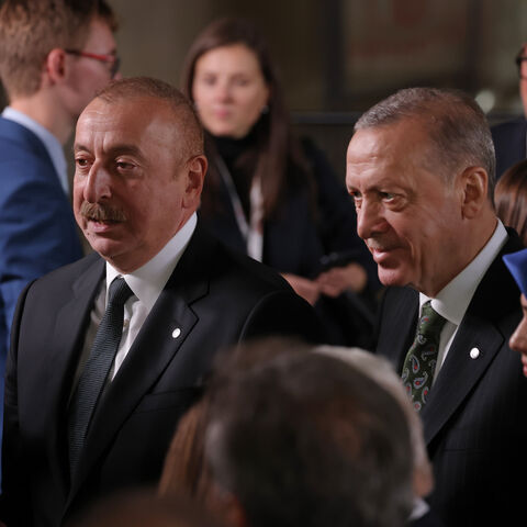 Azerbaijan President Ilham Aliyev (L) and Turkish President Recep Tayyip Erdogan attend the inaugural meeting of the European Political Community (EPC) at Prague Castle on Oct. 6, 2022 in Prague, Czech Republic. 