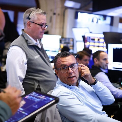 Traders work on the floor of the New York Stock Exchange at the opening bell, New York City, Sept. 28, 2026. 