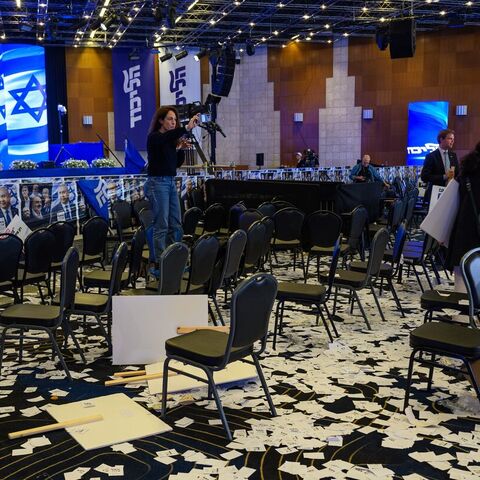 Small notes are left all over the floor at the conclusion of the Likud Party election-night event at the International Convention Center on Oct. 28, 2026, in Jerusalem, Israel. — Alexi J. Rosenfeld/Getty Images