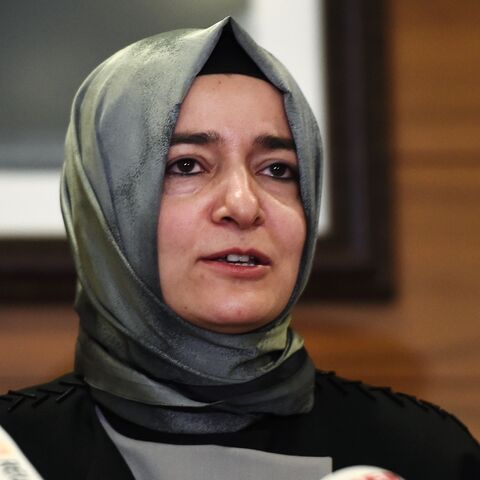 Turkey's Family Minister Fatma Betul Sayan Kaya speaks to media after arriving at the Ataturk International airport on March 12, 2017, in Istanbul. 