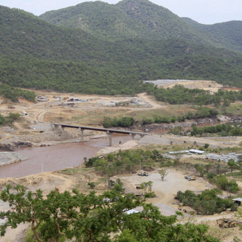 Ethiopia's Great Renaissance Dam is constructed in Guba Woreda, some 40 km (25 miles) from Ethiopia's border with Sudan, June 28, 2013. Egypt fears the $4.7 billion dam, that the Horn of Africa nation is building on the Nile, will reduce a water supply vital for its 84 million people, who mostly live in the Nile valley and delta. Picture taken June 28, 2013. REUTERS/Tiksa Negeri (ETHIOPIA - Tags: POLITICS SOCIETY ENERGY ENVIRONMENT) - RTX115KB