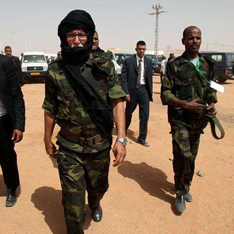 Brahim Ghali (C), new secretary general of Polisario Front and president of the Sahrawi Arab Democratic Republic (SADR), walks at the Sahrawi refugee camp of Dakhla, southeast of the Algerian city of Tindouf, July 9, 2016. REUTERS/Ramzi Boudina? - RTSH3RO
