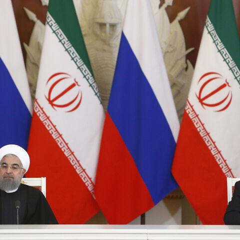 Russian President Vladimir Putin and Iranian President Hassan Rouhani attend a signing ceremony following their meeting at the Kremlin in Moscow, Russia March 28, 2017. REUTERS/Sergei Karpukhin - LR1ED3S15XREP