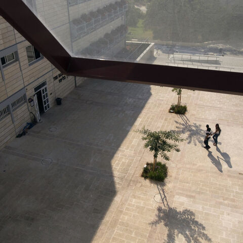 Students walk at the campus of the Ariel University Centre in the West Bank Jewish settlement of Ariel September 13, 2012. An Israeli government move to upgrade Ariel University Centre in the occupied West Bank to a full-fledged university has put the 30-year-old school at the centre of a debate at the core of the Israeli-Palestinian conflict: how the settlements will figure in defining a future Palestinian state. Picture taken September 13, 2012. To match Feature PALESTINIANS-ISRAEL/SETTLEMENTS  REUTERS/Ro