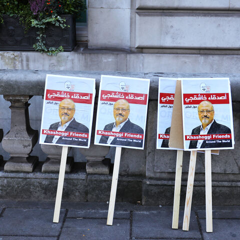 Placards can be seen outside the embassy as people protest against the killing of journalist Jamal Khashoggi in Turkey outside the Saudi Arabian Embassy in London, Britain, October 26 2018. REUTERS/Simon Dawson - RC1CC0BA7F80