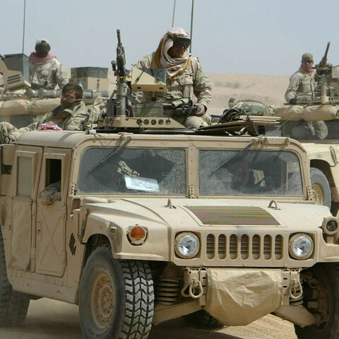 US Army special forces sit on top of their Humvees as they secure
important ground in the south of the city of Najaf in central Iraq,
March 23, 2003. US infantry and engineers secured the ground after
heavy gun fires with Iraqi soldiers during the night. REUTERS/Kai
Pfaffenbach REUTERS

KP/FMS - RP3DRINFAQAA